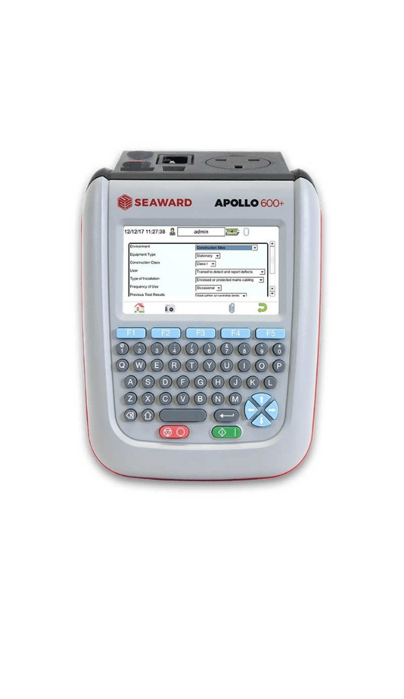 A professional PAT tester inspecting an electrical appliance with specialized testing equipment for safety compliance.